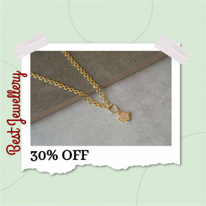 Close-up of a gold clover pendant necklace on a neutral background with a sale promotion.