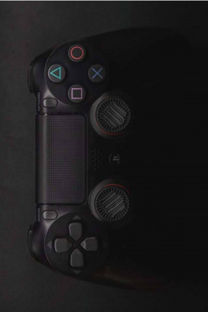 Close-up of a black PlayStation 4 controller