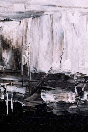 Close-up of an abstract painting with black and white brushstrokes