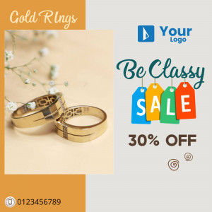 Close-up of gold rings with a sale promotion graphic.