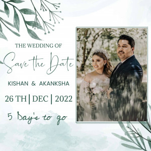 Save the Date card with a couple's photo and floral design