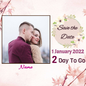 Couple's Save the Date card with floral wreath and countdown