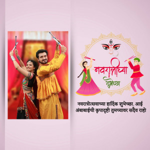 Couple celebrating Navratri with Dandiya sticks and festive decorations