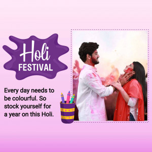 Couple celebrating Holi with colors and festive decorations