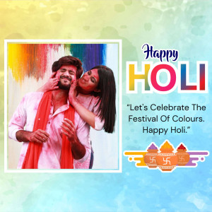 Couple celebrating Holi with colors and joy