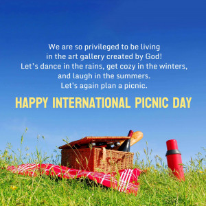 Picnic basket in a field with a blue sky and text celebrating International Picnic Day