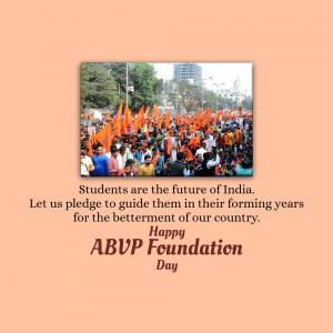 A large crowd of people, predominantly wearing orange, marching in a street with buildings in the background. Text reads 'Students are the future of India' and 'ABVP Foundation Day'.
