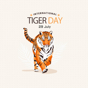 Illustration of a tiger walking towards the viewer with text 'International Tiger Day - 29 July'