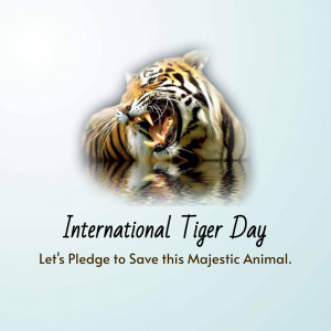 A majestic tiger with the text 'International Tiger Day - Let's Pledge to Save this Majestic Animal.'