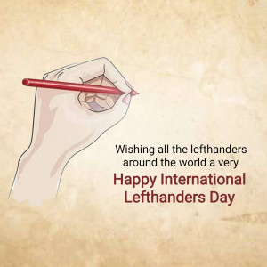Hand holding a red pencil with text wishing happy International Lefthanders Day
