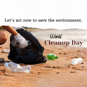 Person picking up trash on a beach for World Cleanup Day