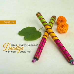 Colorful Dandiya sticks with marigold flowers and leaves
