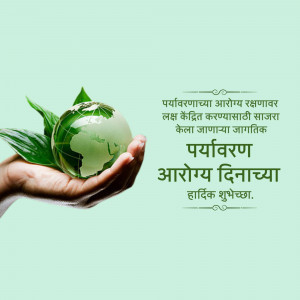 A hand holding a globe with green leaves, symbolizing environmental care.