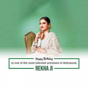 Rekha holding an award with a birthday greeting