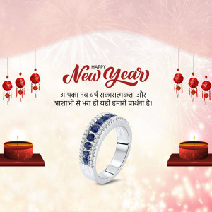 Silver ring with blue stones and New Year decorations