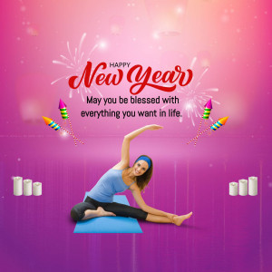 Woman doing yoga with New Year fireworks and candles