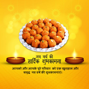 Plate of orange laddoos with Diwali-style lights and New Year greetings in Hindi.