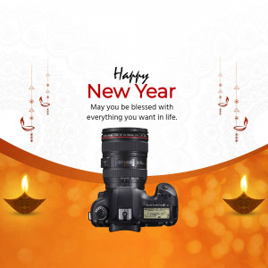 New Year greeting with a DSLR camera and festive decorations