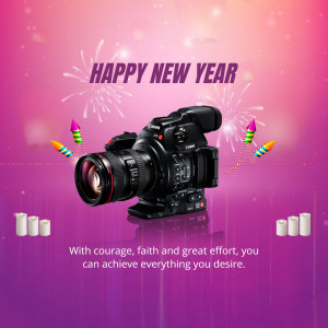 Canon camera with New Year fireworks and candles