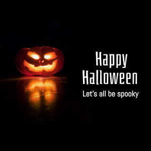 A glowing jack-o'-lantern with the text 'Happy Halloween. Let's all be spooky'