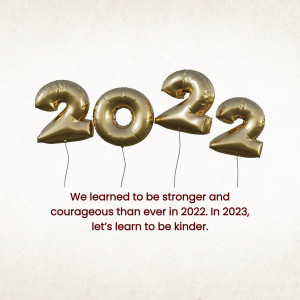 Gold foil balloons spelling 2022 with a motivational message