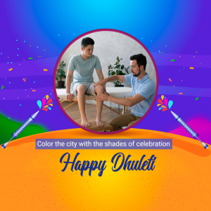 A physiotherapist assisting a young patient with leg exercises, with festive Dhulleti decorations.