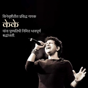 Black and white image of Arijit Singh singing into a microphone on stage.