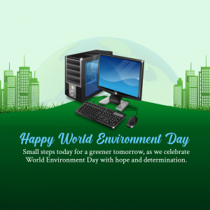 Computer on a green hill with city skyline for World Environment Day
