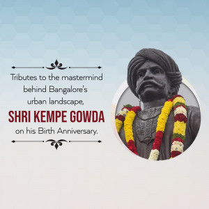 Statue of Kempe Gowda with floral garland and text commemorating his birth anniversary.