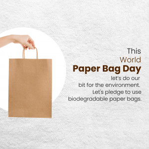 Hand holding a brown paper bag with text celebrating World Paper Bag Day