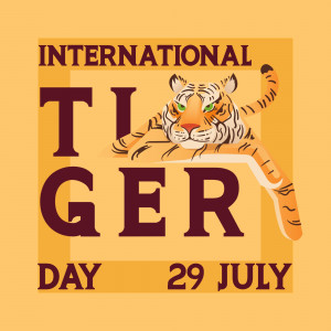 Illustration of a tiger head with the text 'International Tiger Day - 29 July'