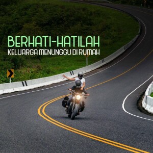 Motorcycle rider on a winding road with a safety message.