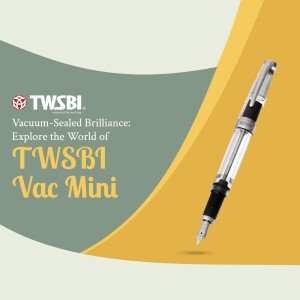 Close-up of a TWSBI Vac Mini fountain pen with a transparent body and silver accents.