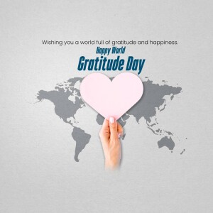 World map with a hand holding a pink heart and text 'Happy World Gratitude Day'