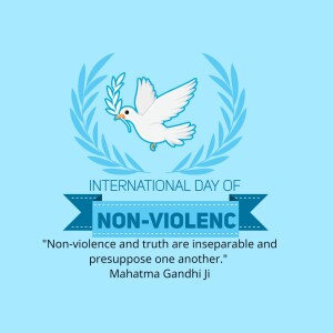 Image depicting a white dove carrying an olive branch within a laurel wreath, with text celebrating the International Day of Non-Violence and a quote by Mahatma Gandhi.