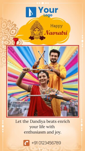 Couple performing Dandiya dance during Navratri festival