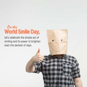 Person with a paper bag over their head with a smiley face giving a thumbs up for World Smile Day.