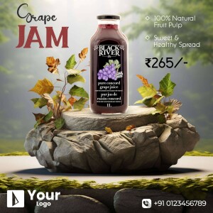 A bottle of Black River Grape Jam displayed on a stone surface with grape leaves.