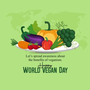 A colorful illustration of various fresh vegetables on a plate with the text 'Happy World Vegan Day'.