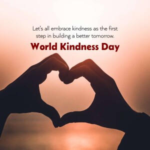Silhouette of hands forming a heart shape with text 'World Kindness Day'