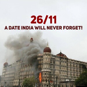 Image depicting the aftermath of the 26/11 Mumbai attacks with smoke billowing from the Taj Mahal Palace Hotel.