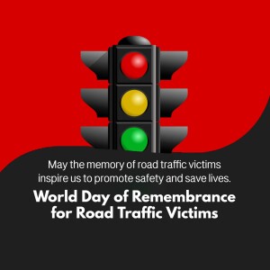 Traffic light with red, yellow, and green lights, and text commemorating World Day of Remembrance for Road Traffic Victims.