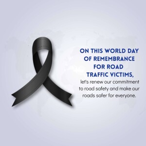 Black ribbon symbolizing remembrance for road traffic victims with text.