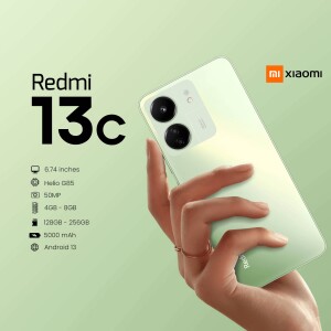 Redmi 13C smartphone in a hand, showcasing its design and features.