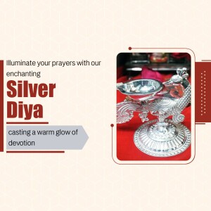 Silver diya in the shape of a peacock