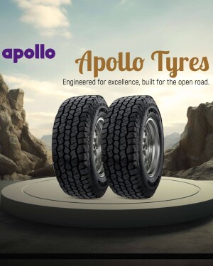 Apollo Tyres advertisement featuring two off-road tyres on a pedestal.