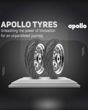 Apollo Tyres advertisement featuring two motorcycle tyres on a white platform.