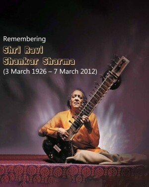 Portrait of Ravi Shankar playing the sitar