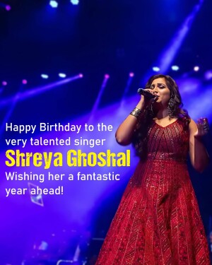Shreya Ghoshal singing on stage with birthday wishes