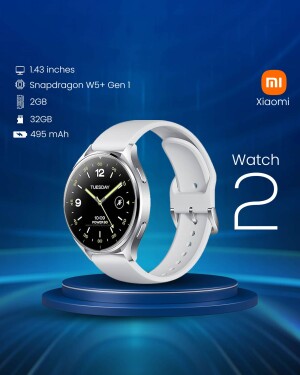 Xiaomi Watch 2 with white strap on a pedestal, showcasing its features.